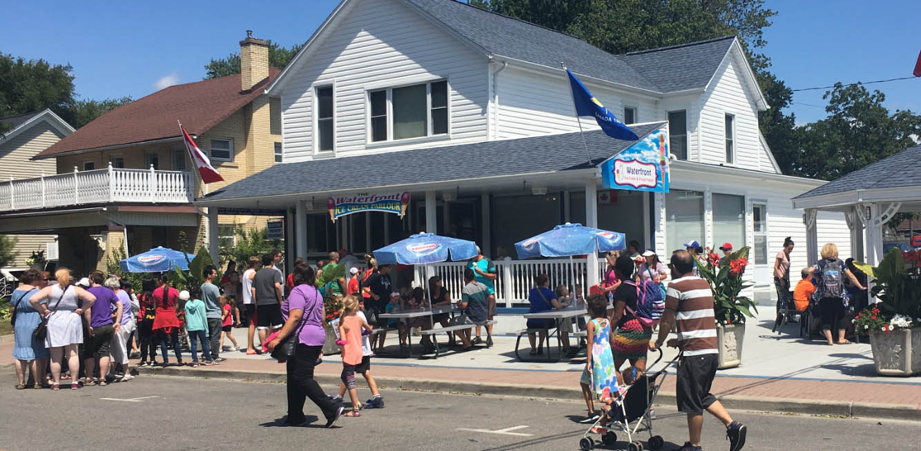 A group of people walking down the street.